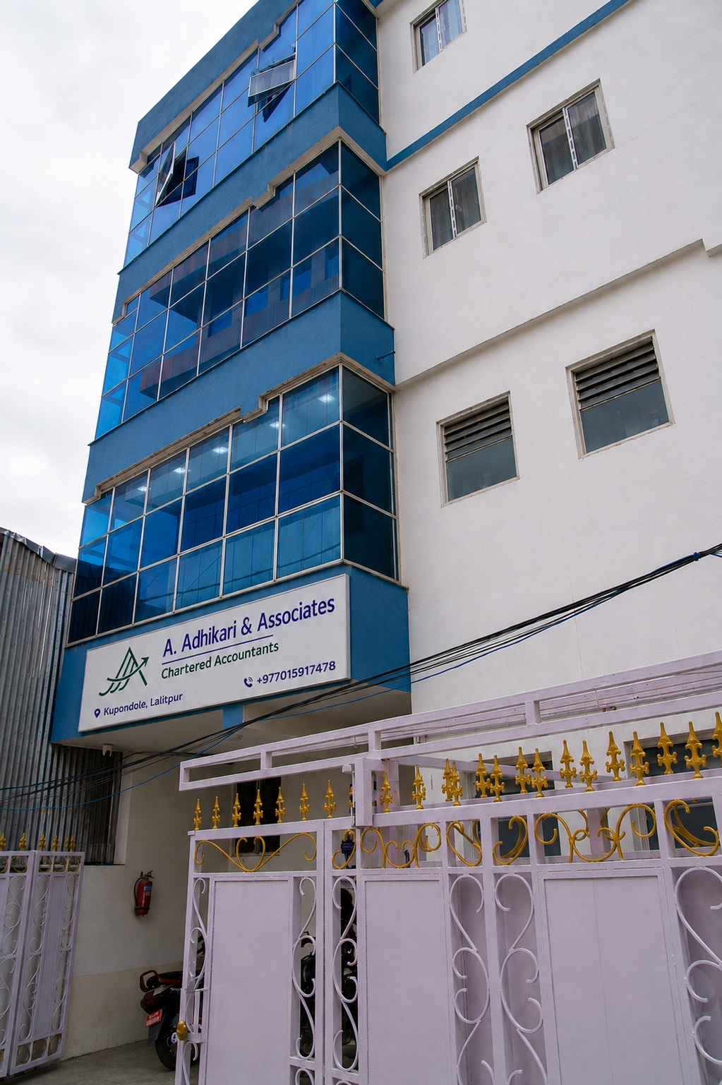 The A. Adhikari & Associates office and signboard in Kupondole, Lalitpur