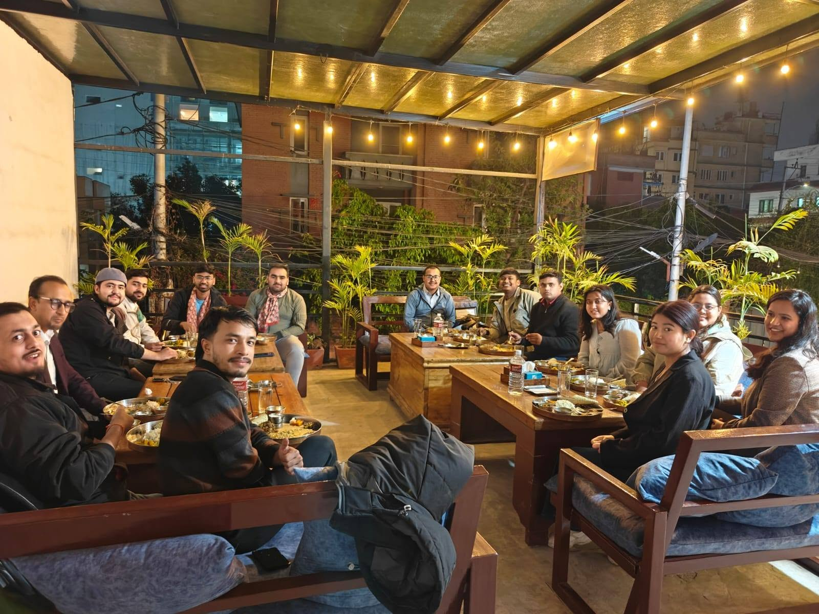 The A. Adhikari & Associates team sharing a dinner together in Kathmandu